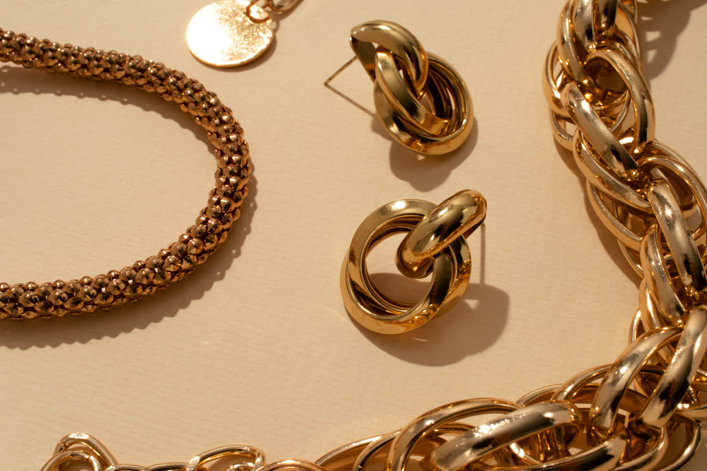 Gold chains and knot earrings
